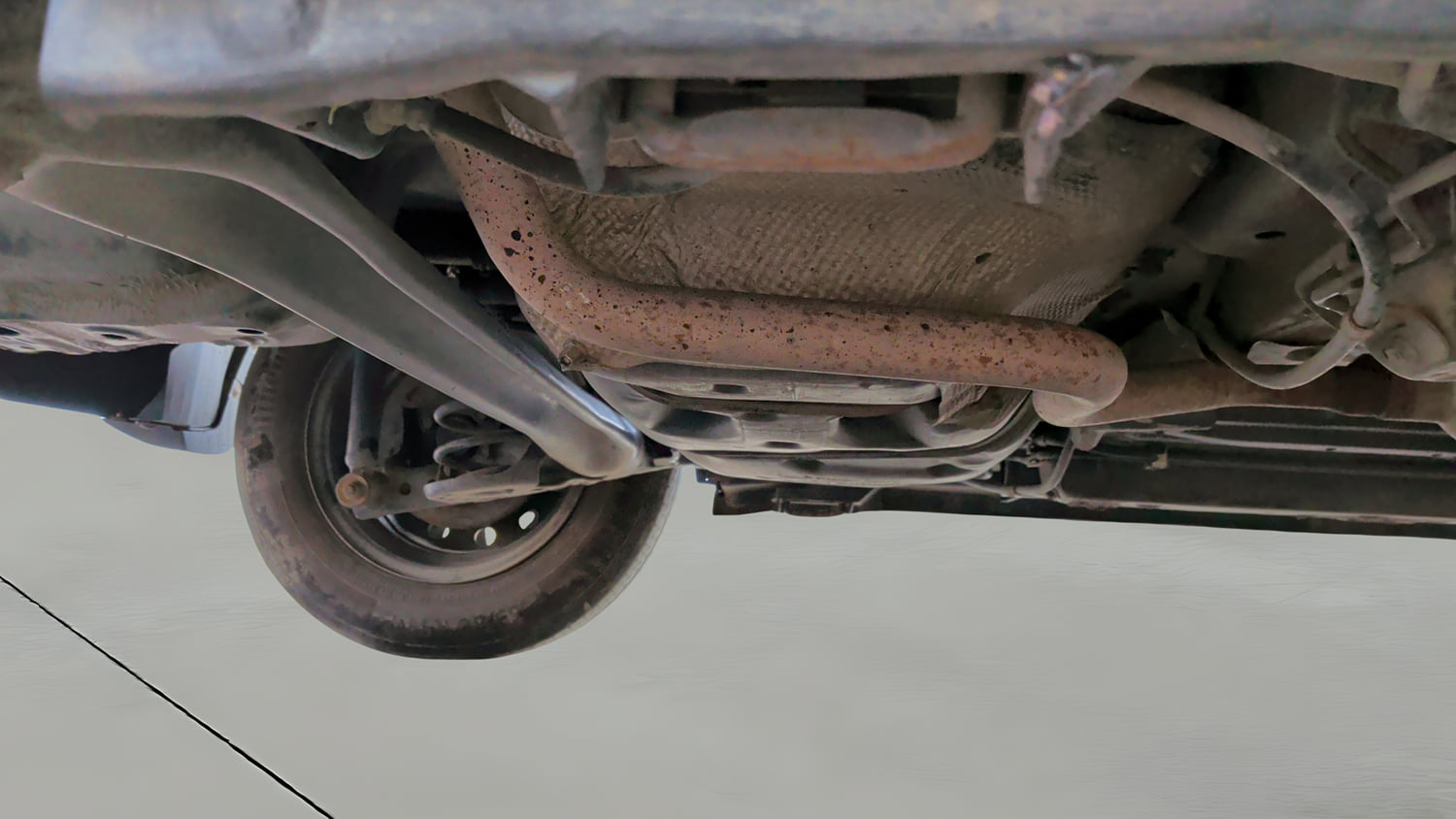 Used 2014 Maruti Suzuki Swift Dzire VXI Petrol Manual extra REAR RIGHT UNDERBODY VIEW