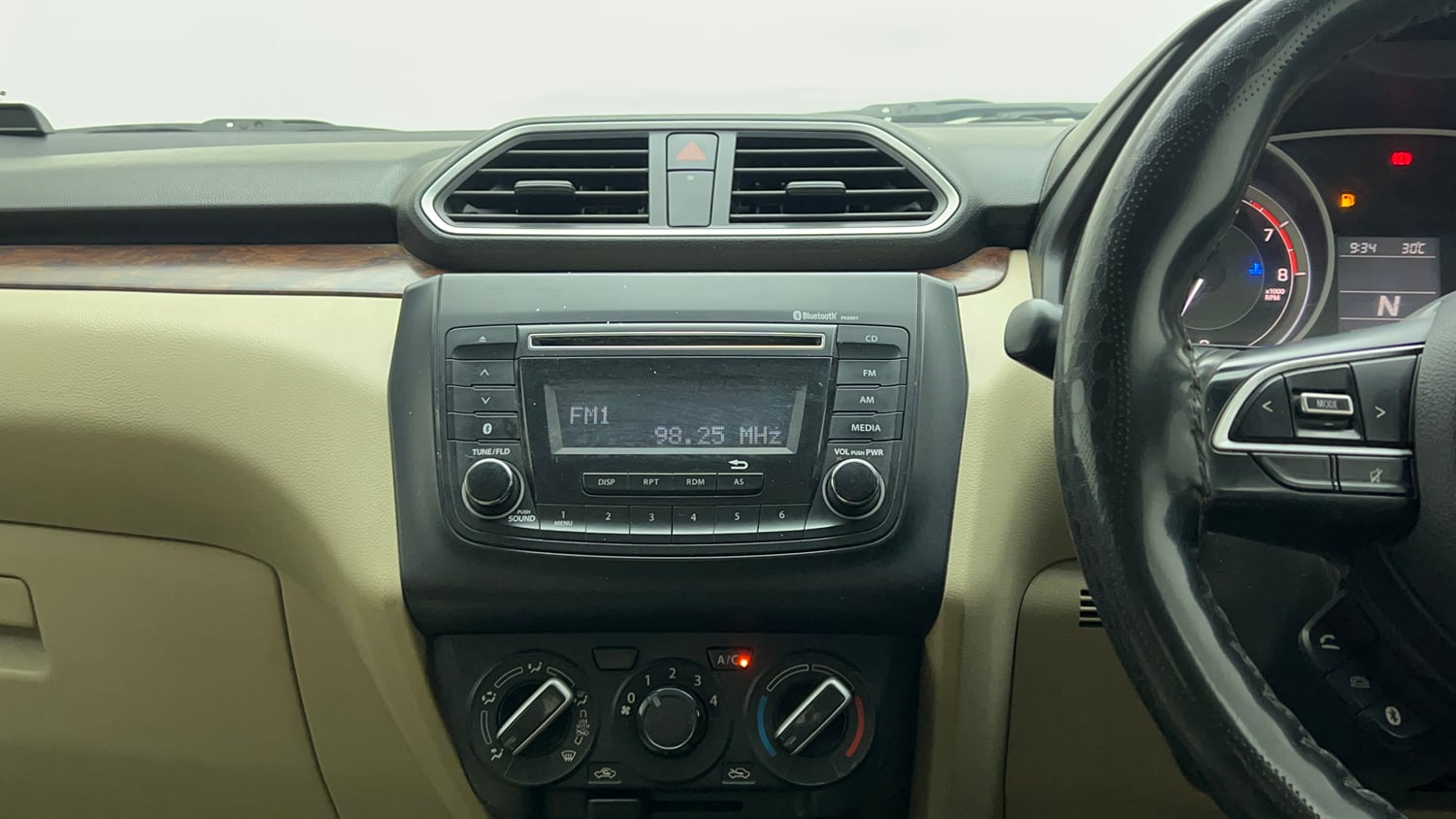 Used 2018 Maruti Suzuki Dzire VXi AMT Petrol Automatic top_features Integrated (in-dash) music system