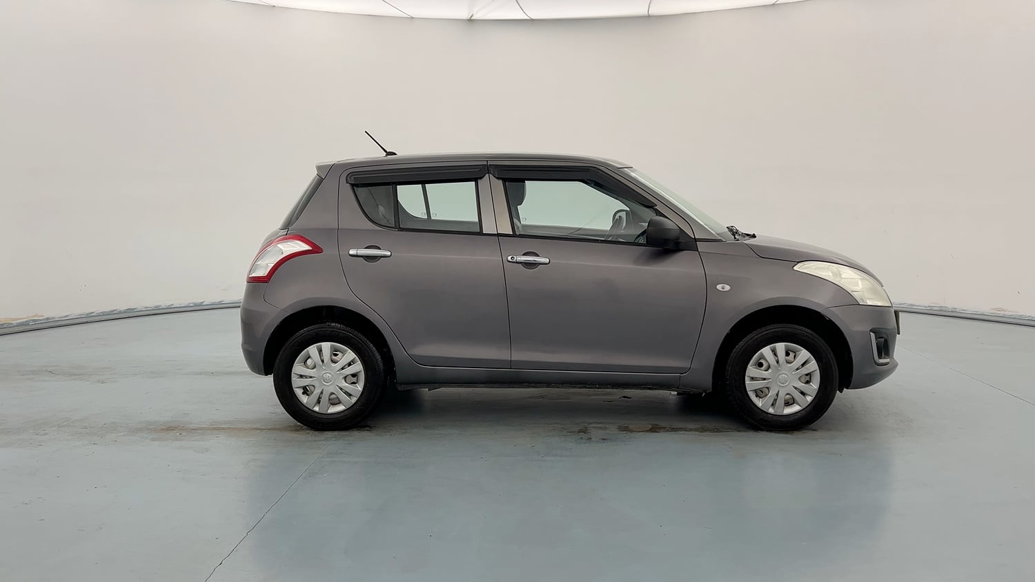 Used 2017 Maruti Suzuki Swift LXi Petrol Manual exterior RIGHT SIDE VIEW