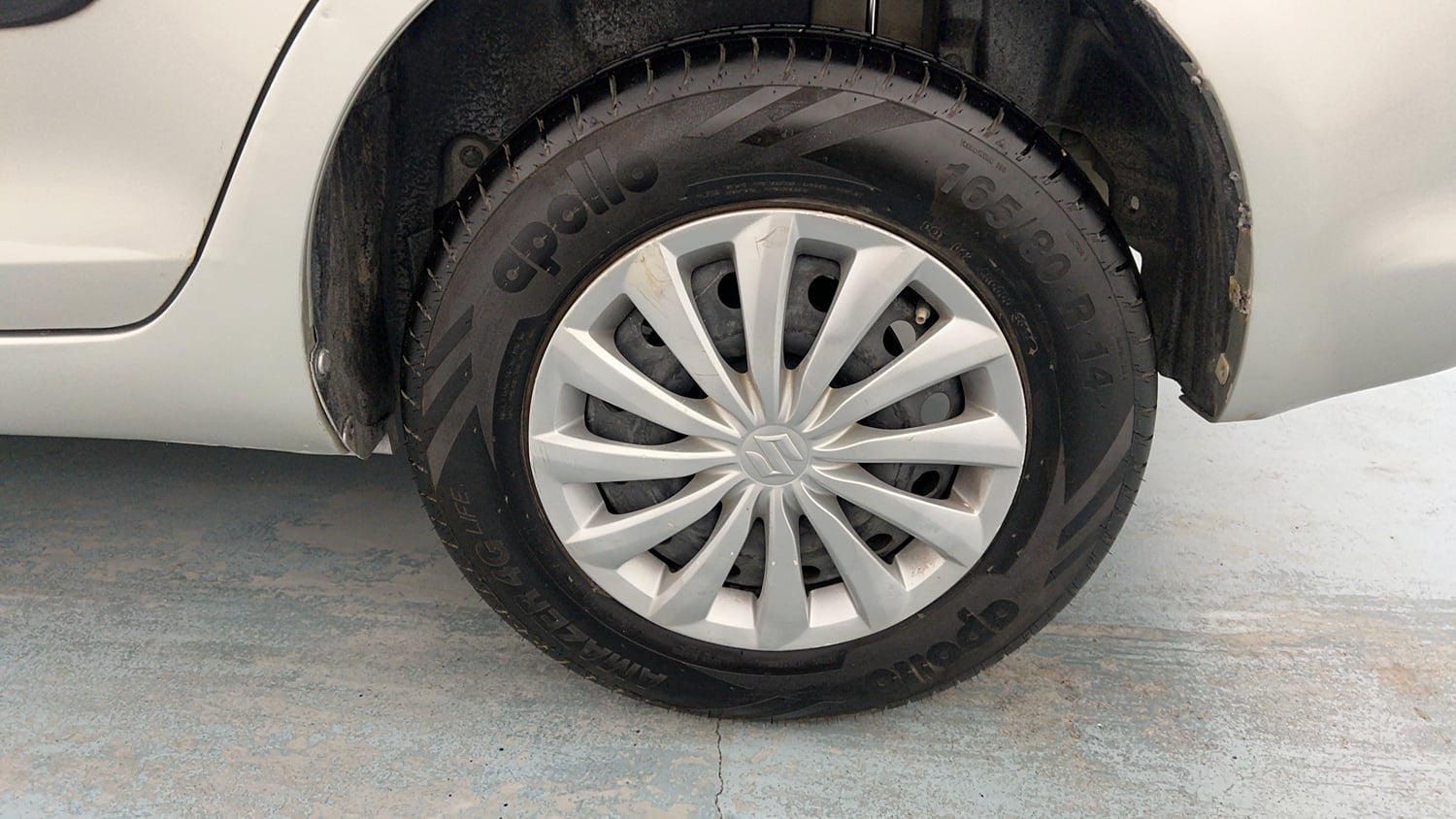 Used 2015 Maruti Suzuki Swift Dzire VXI Petrol Manual tyres LEFT REAR TYRE RIM VIEW