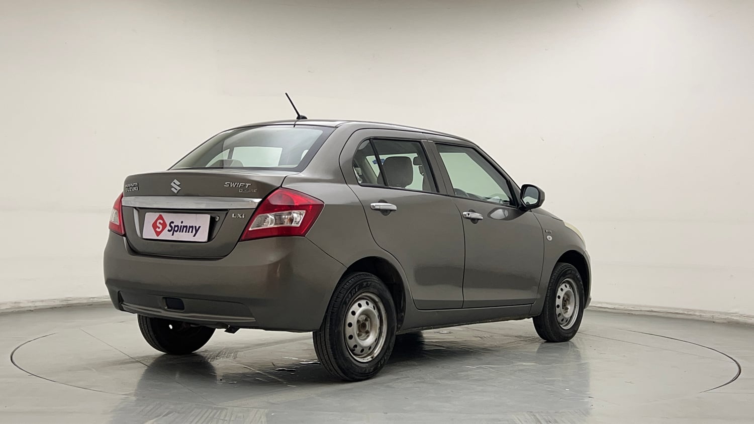 Used 2015 Maruti Suzuki Swift Dzire LXI (O) Petrol Manual exterior RIGHT REAR CORNER VIEW