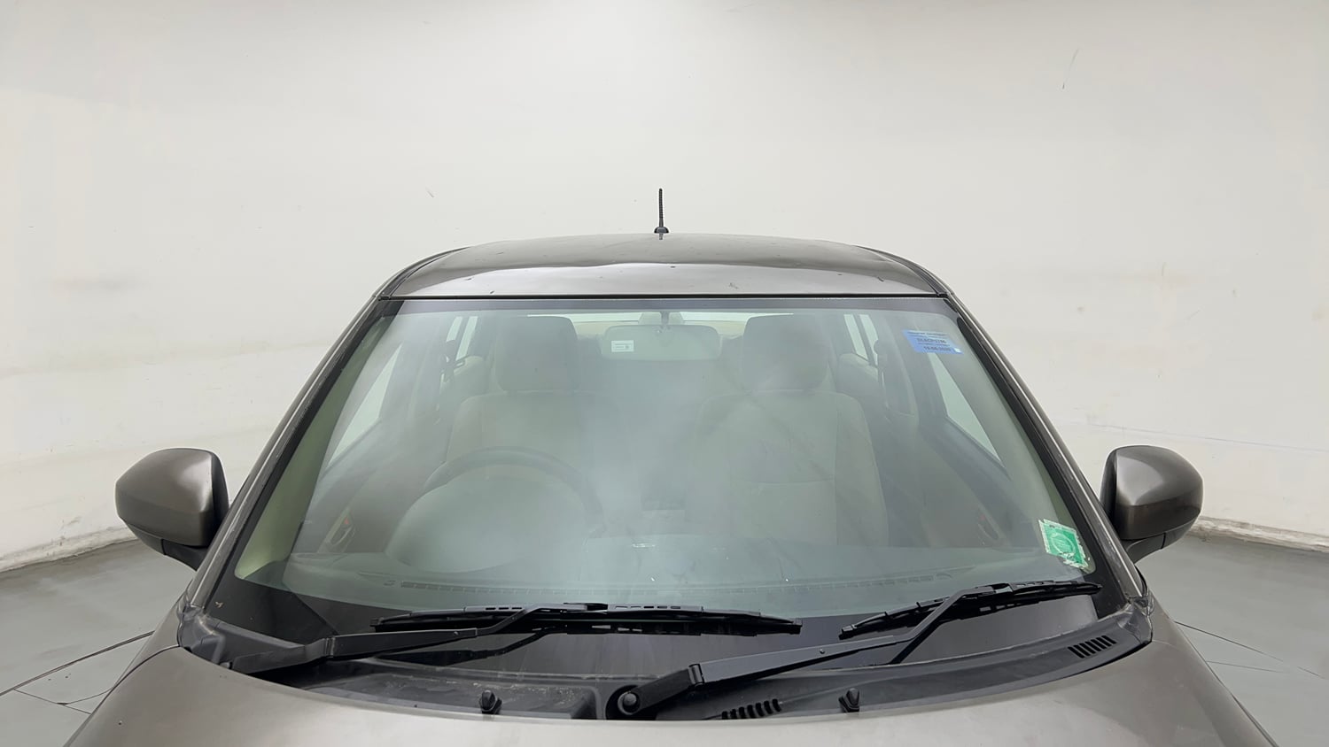 Used 2015 Maruti Suzuki Swift Dzire LXI (O) Petrol Manual exterior FRONT WINDSHIELD VIEW