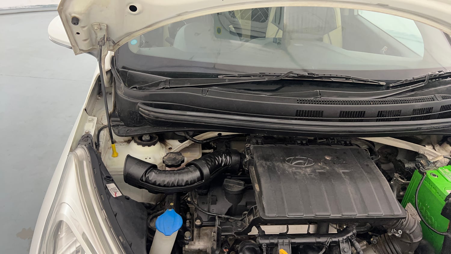 Used 2019 Hyundai Grand i10 Sportz 1.2 Kappa VTVT Petrol Manual engine ENGINE RIGHT SIDE HINGE & APRON VIEW