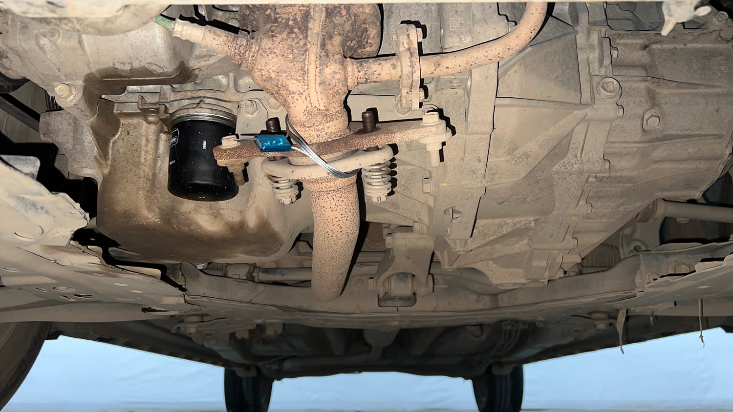 Used 2022 Maruti Suzuki XL6 Zeta MT Petrol Petrol Manual extra FRONT LEFT UNDERBODY VIEW