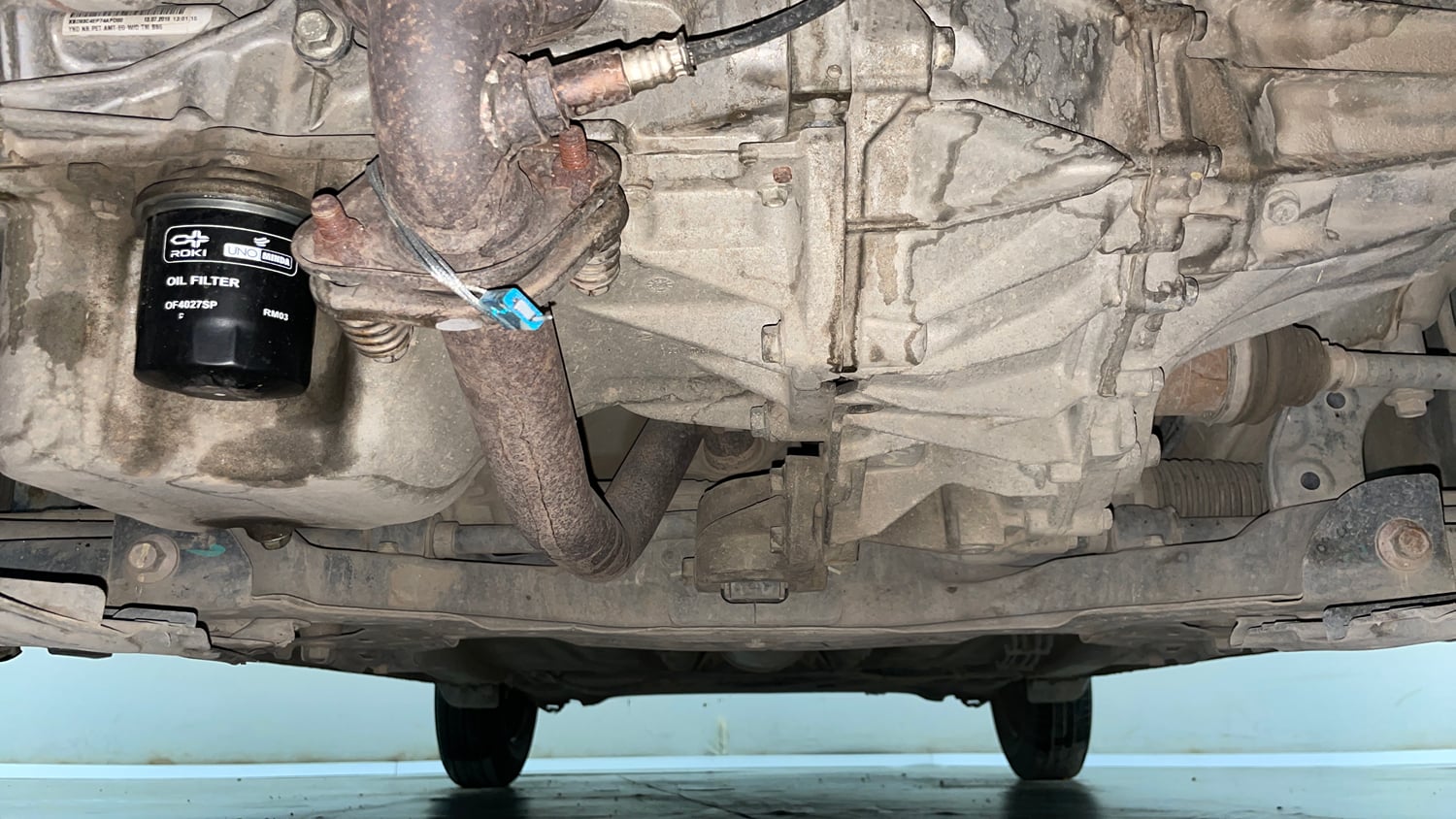 Used 2019 Maruti Suzuki Dzire VXi AMT Petrol Automatic extra FRONT LEFT UNDERBODY VIEW