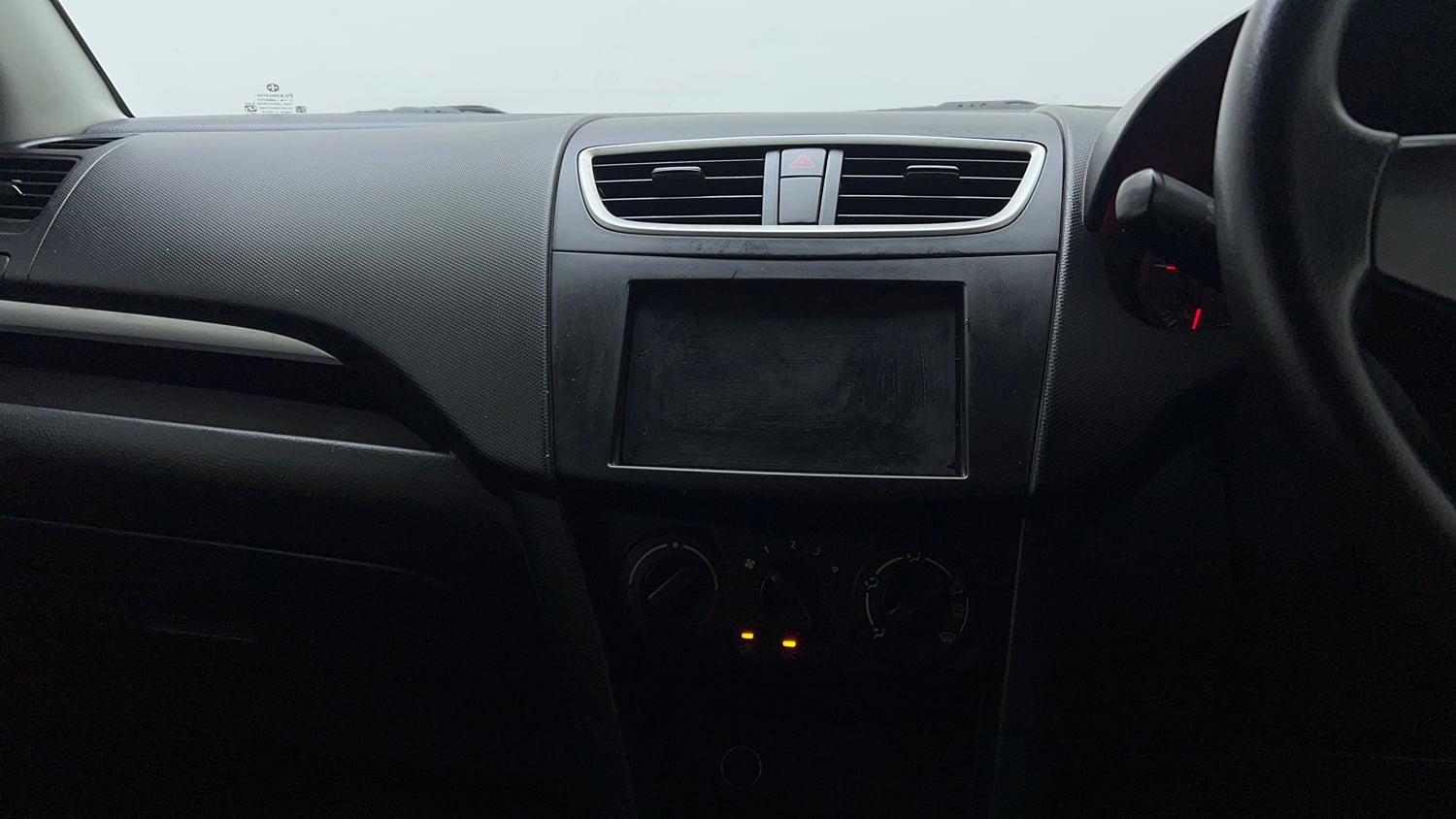Used 2017 Maruti Suzuki Swift Lxi (O) Petrol Manual interior MUSIC SYSTEM & AC CONTROL VIEW
