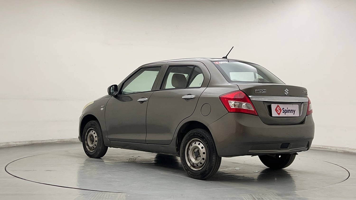 Used 2015 Maruti Suzuki Swift Dzire LXI (O) Petrol Manual exterior LEFT REAR CORNER VIEW