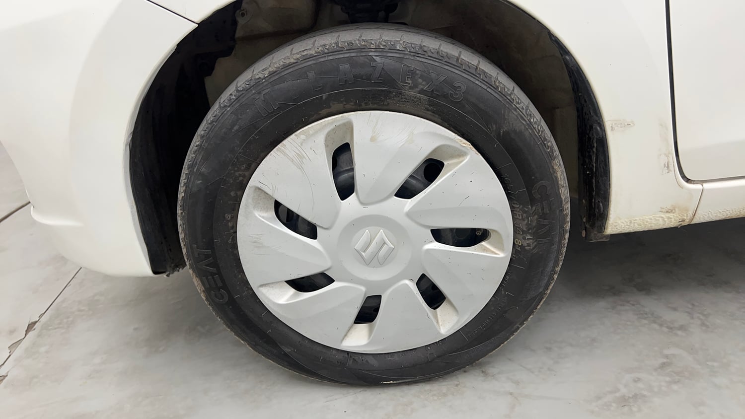 Used 2017 Maruti Suzuki Celerio VXI (O) AMT Petrol Automatic tyres LEFT FRONT TYRE RIM VIEW