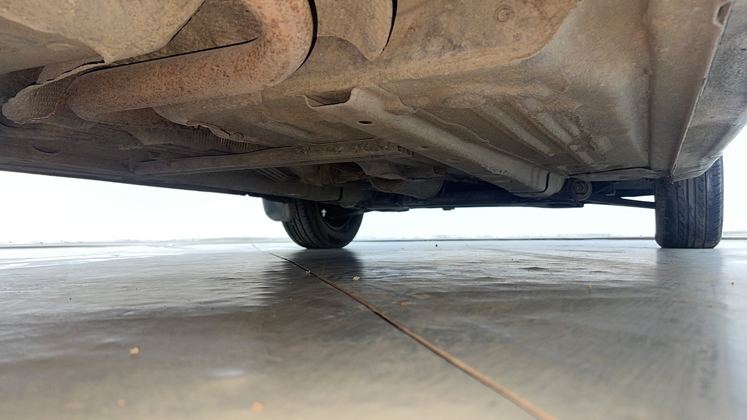 Used 2012 Ford Figo Duratec Petrol ZXI 1.2 Petrol Manual extra REAR RIGHT UNDERBODY VIEW
