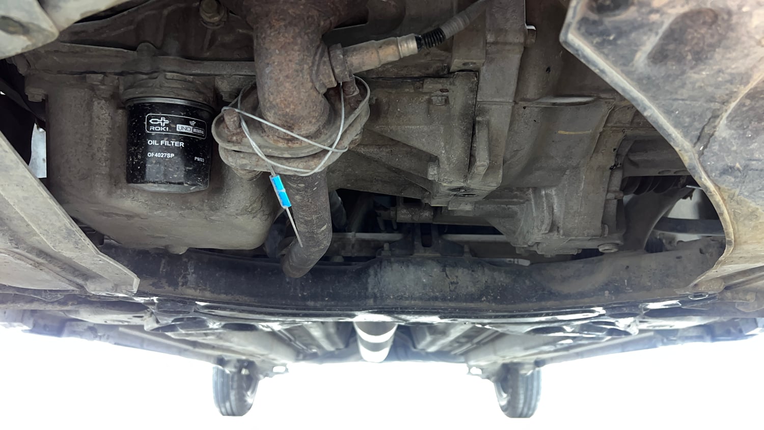 Used 2015 Maruti Suzuki Swift Dzire VXI Petrol Manual extra FRONT LEFT UNDERBODY VIEW