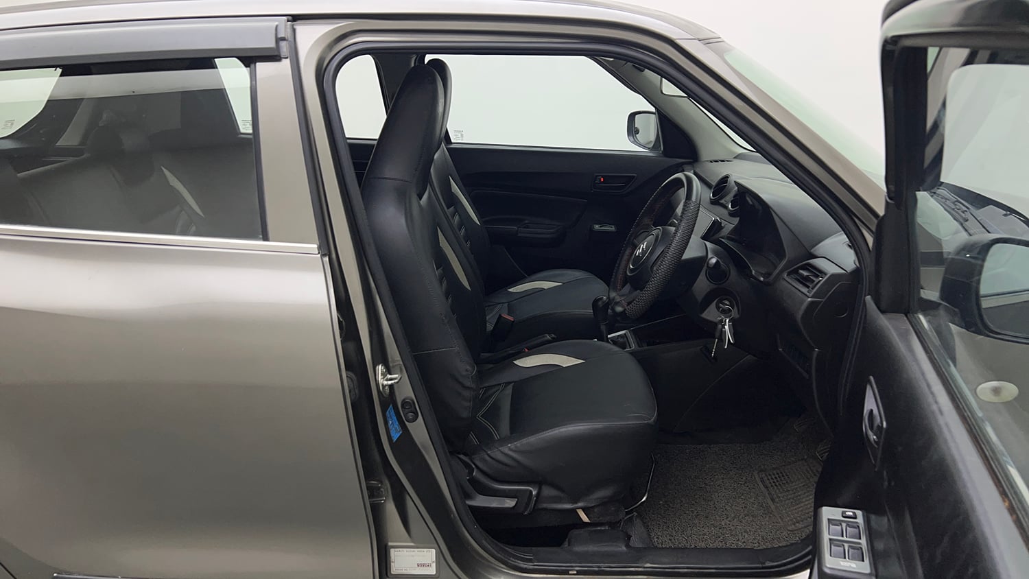 Used 2021 Maruti Suzuki Swift LXi Petrol Manual interior RIGHT SIDE FRONT DOOR CABIN VIEW