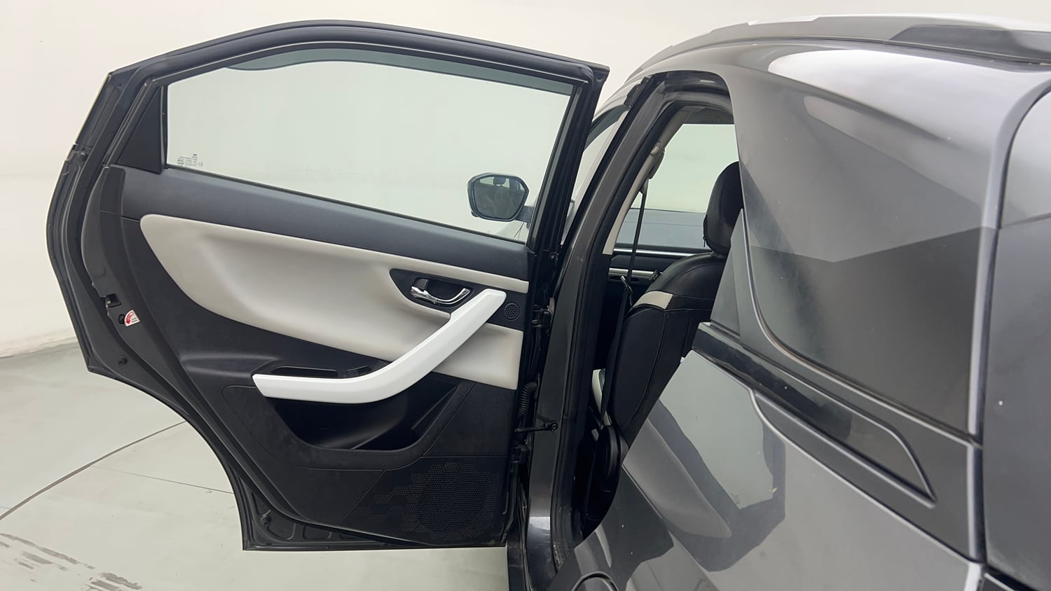 Used 2024 Tata Nexon Creative Plus S 1.2 Revotron Petrol 6AMT Petrol Automatic interior LEFT REAR DOOR OPEN VIEW