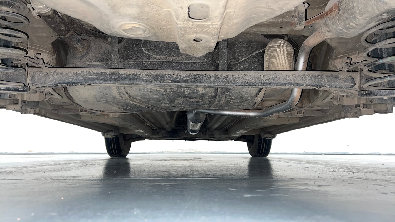 Used 2015 Maruti Suzuki Swift Dzire VXI Petrol Manual extra REAR UNDERBODY VIEW (TAKEN FROM REAR)