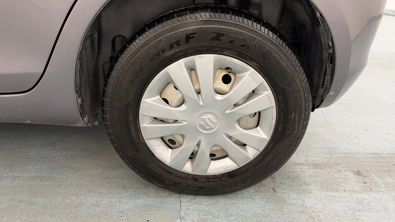 Used 2017 Maruti Suzuki Swift LXi Petrol Manual tyres LEFT REAR TYRE RIM VIEW