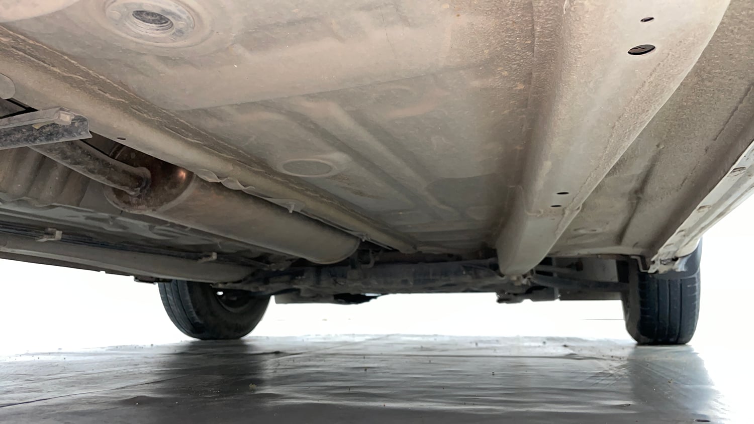 Used 2019 Maruti Suzuki Dzire VXi AMT Petrol Automatic extra REAR RIGHT UNDERBODY VIEW