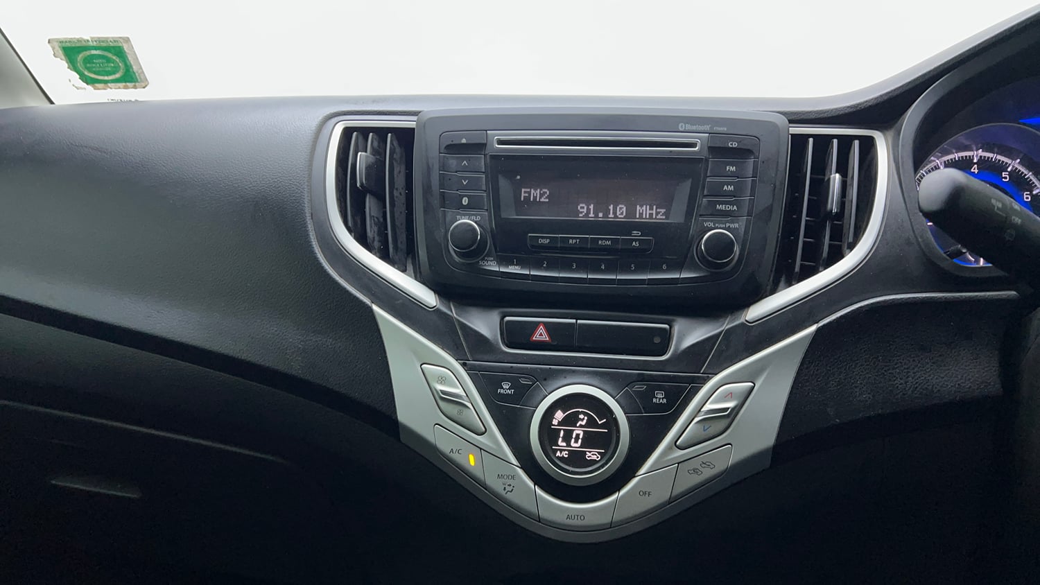 Used 2018 Maruti Suzuki Baleno Zeta 1.2 Petrol Manual top_features Integrated (in-dash) music system