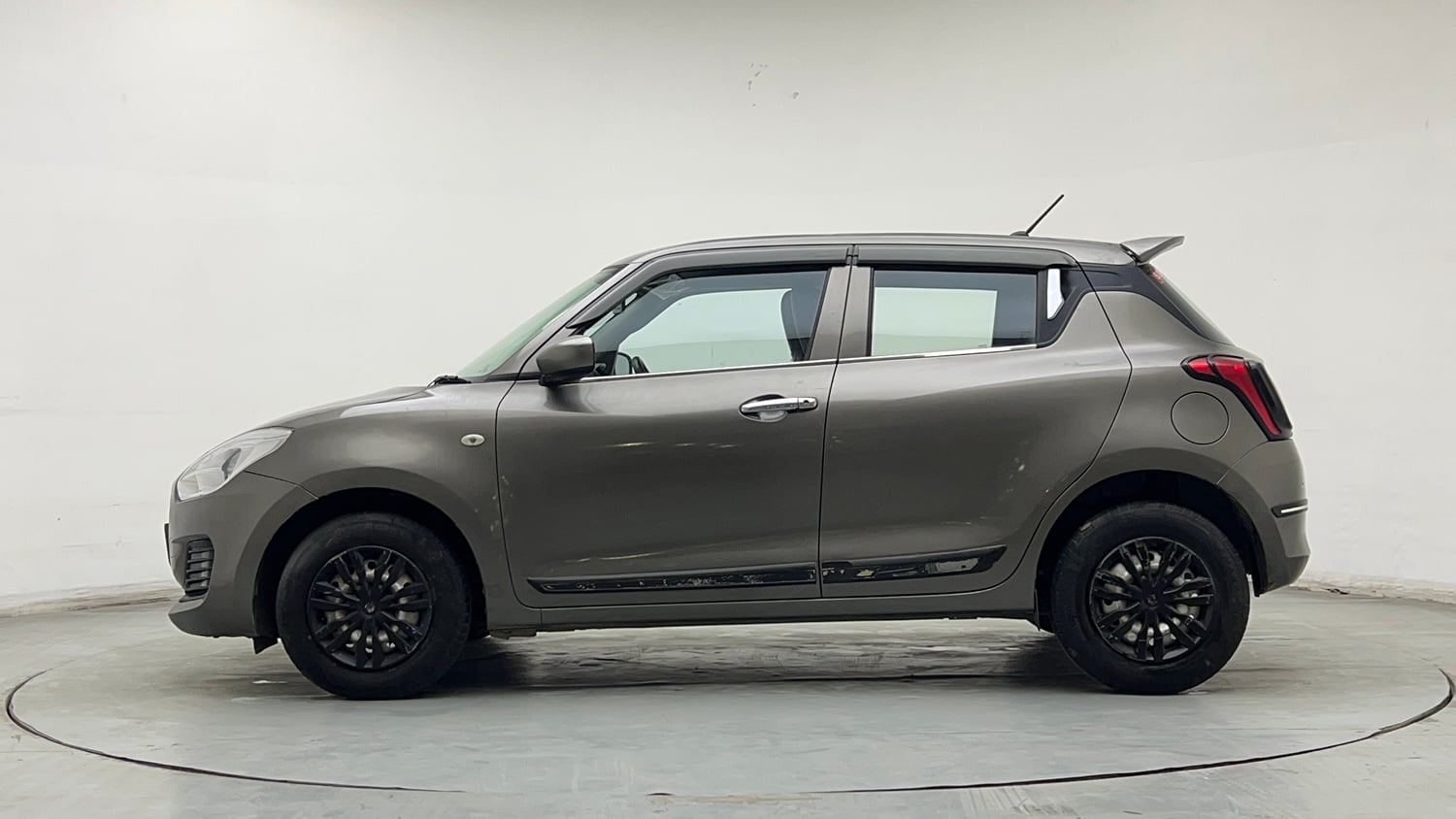 Used 2021 Maruti Suzuki Swift LXi Petrol Manual exterior LEFT SIDE VIEW