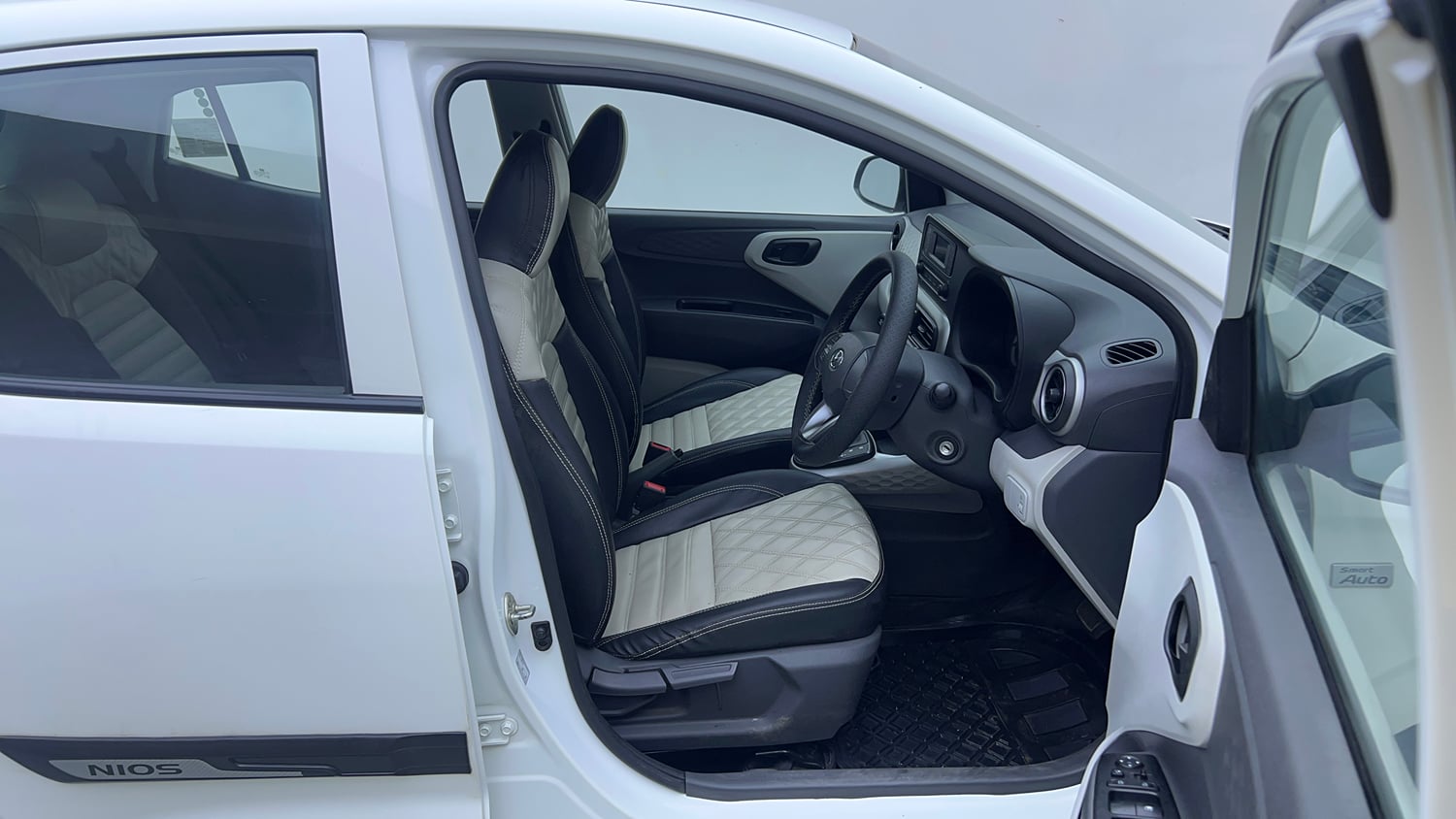 Used 2022 Hyundai Grand i10 Nios Magna AMT 1.2 Kappa VTVT Petrol Automatic interior RIGHT SIDE FRONT DOOR CABIN VIEW