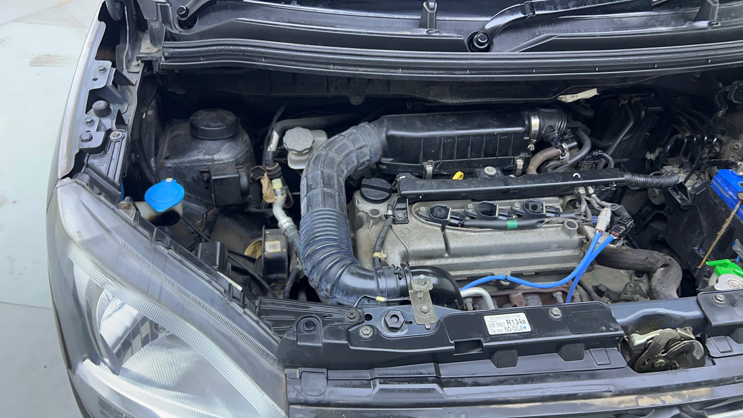 Used 2021 Maruti Suzuki Wagon R 1.0 VXi (O) 1.0 Petrol Manual engine ENGINE RIGHT SIDE VIEW