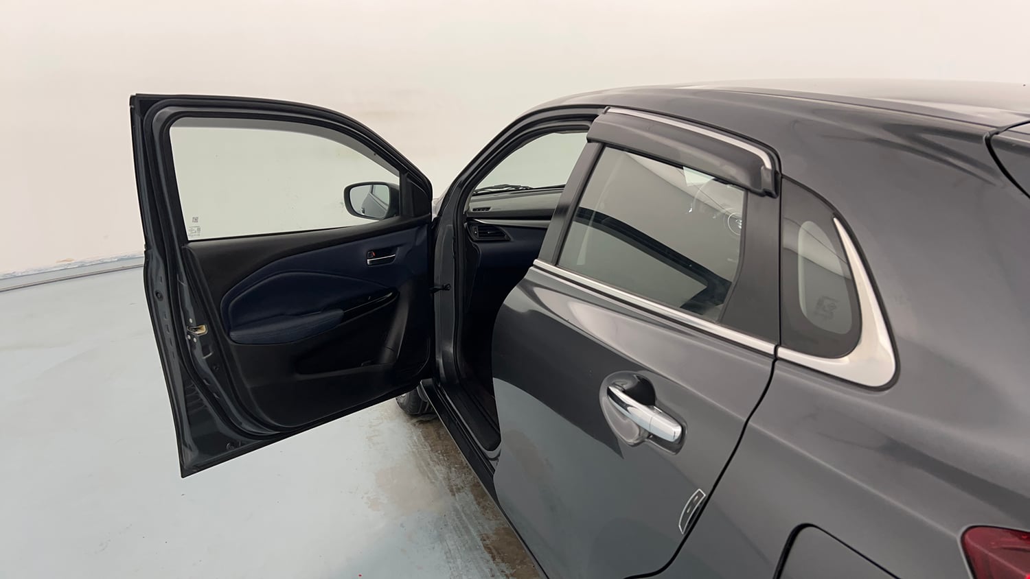 Used 2024 Maruti Suzuki Baleno Zeta MT Petrol Manual interior LEFT FRONT DOOR OPEN VIEW