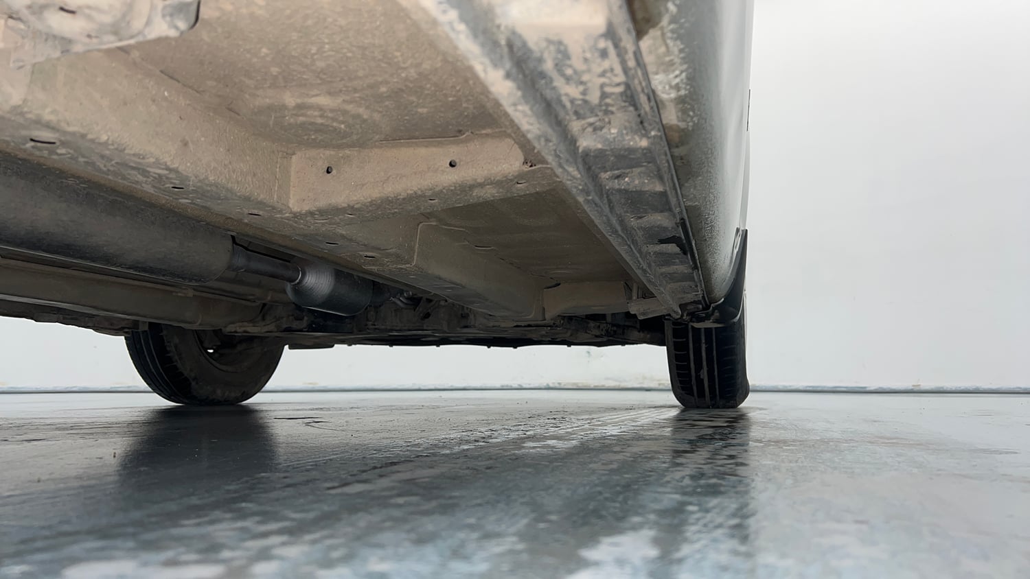 Used 2015 Maruti Suzuki Swift Dzire VXI Petrol Manual extra REAR RIGHT UNDERBODY VIEW