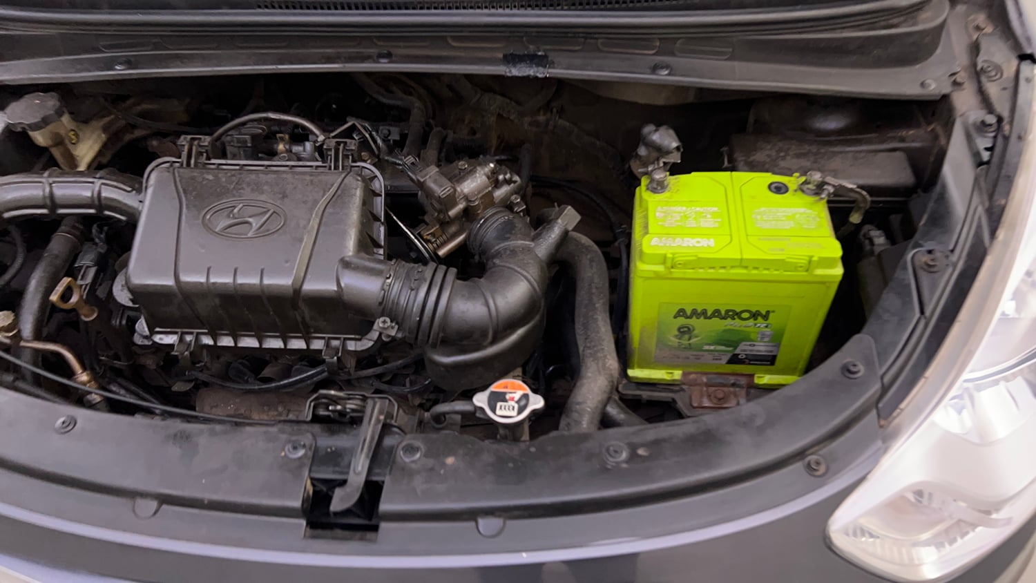 Used 2015 Hyundai i10 Sportz 1.1 iRDE2 Petrol Manual engine ENGINE LEFT SIDE VIEW