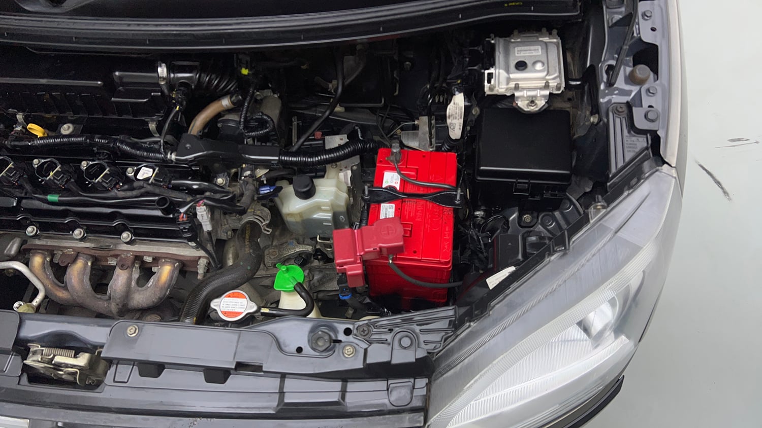 Used 2019 Maruti Suzuki Wagon R VXi (O) 1.2 AMT Petrol Automatic engine ENGINE LEFT SIDE VIEW