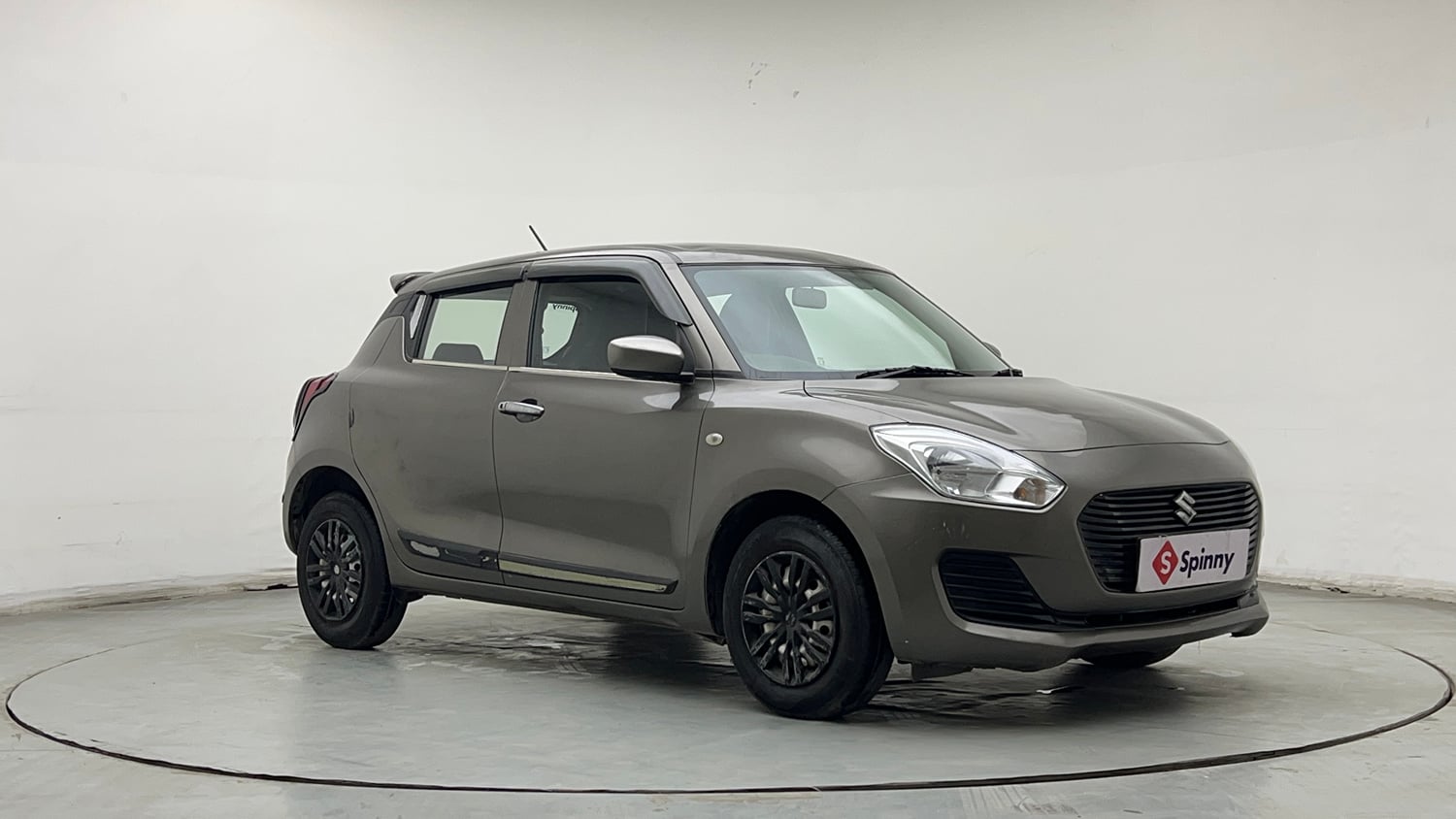 Used 2021 Maruti Suzuki Swift LXi Petrol Manual exterior RIGHT FRONT CORNER VIEW