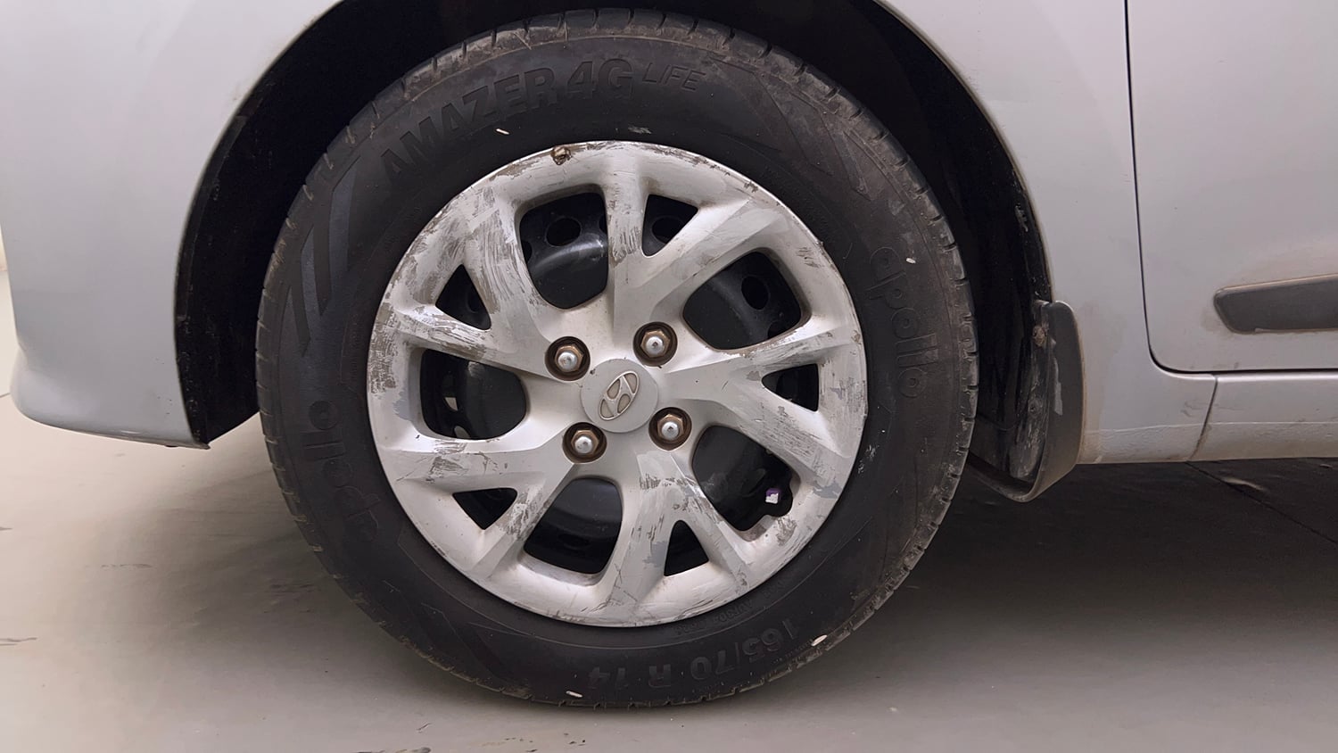 Used 2019 Hyundai Grand i10 Sportz 1.2 Kappa VTVT Petrol Manual tyres LEFT FRONT TYRE RIM VIEW
