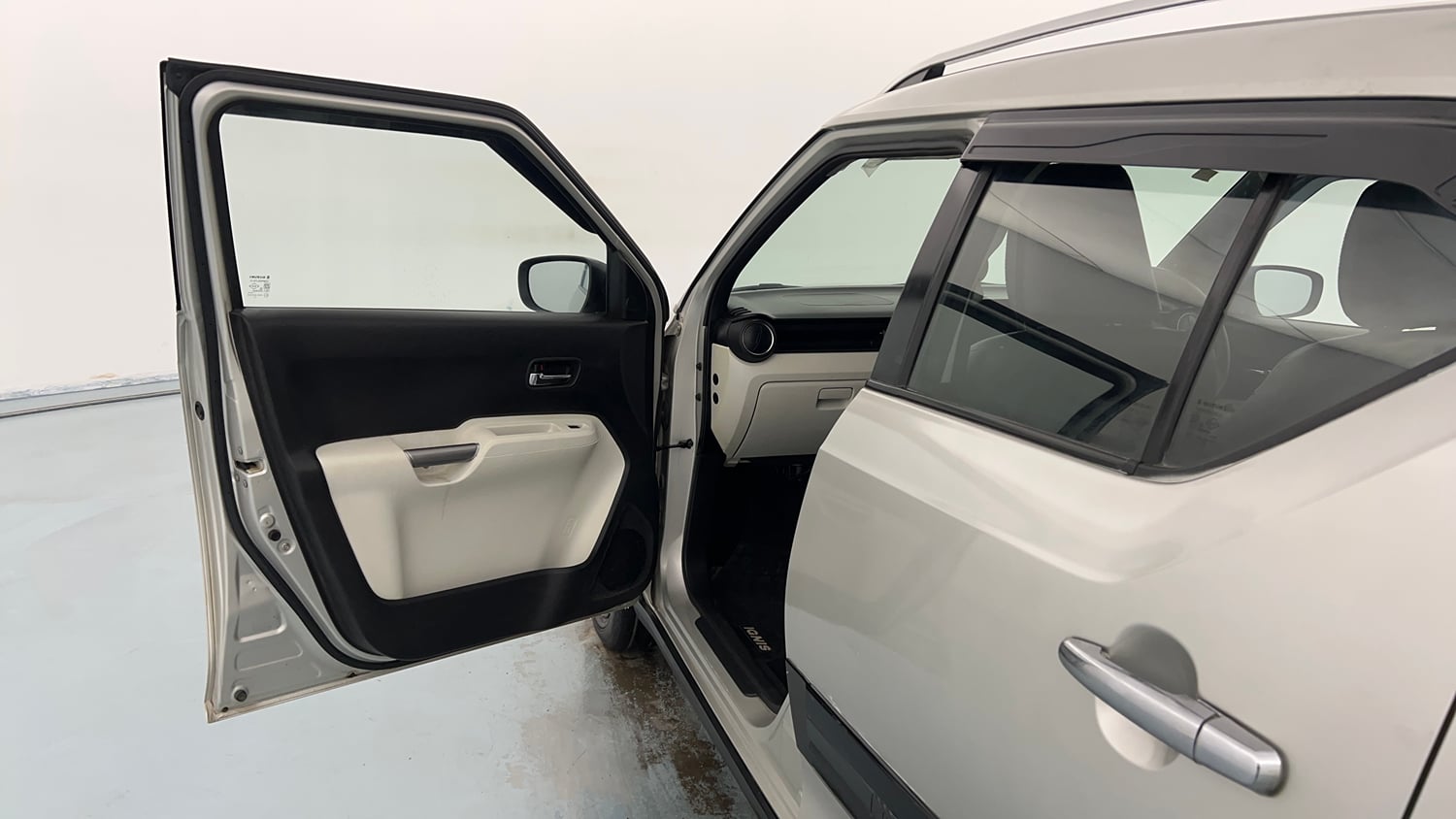 Used 2023 Maruti Suzuki Ignis Zeta 1.2 MT Petrol Manual interior LEFT FRONT DOOR OPEN VIEW