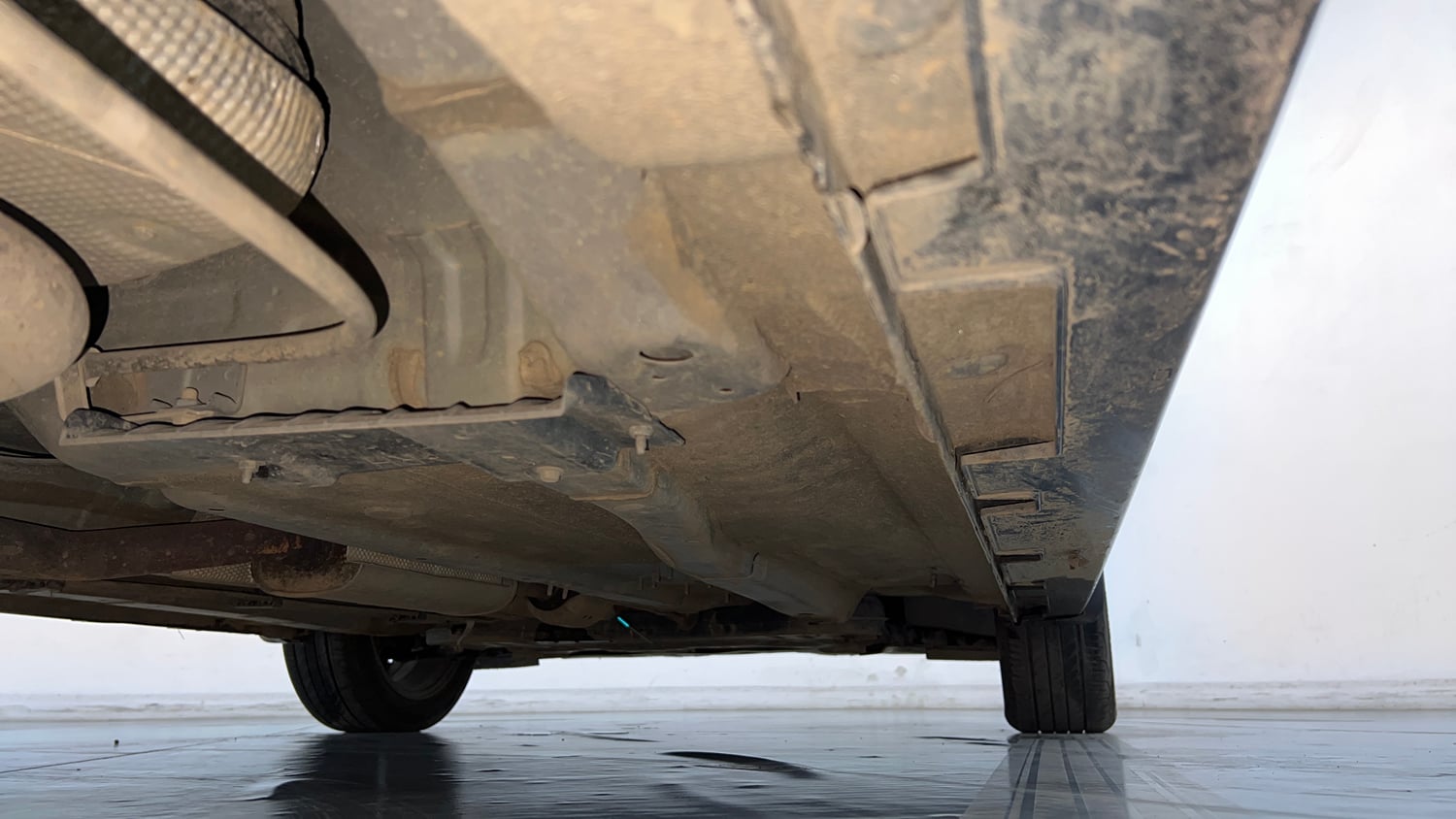 Used 2021 Hyundai New i20 Asta (O) 1.0 Turbo DCT Petrol Automatic extra REAR RIGHT UNDERBODY VIEW