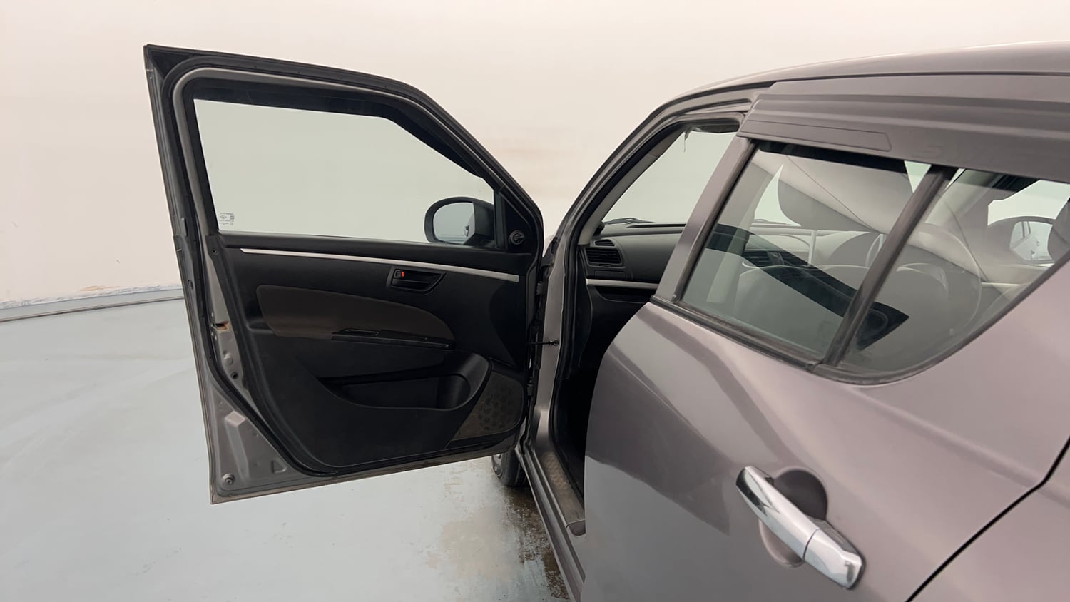 Used 2017 Maruti Suzuki Swift LXi Petrol Manual interior LEFT FRONT DOOR OPEN VIEW