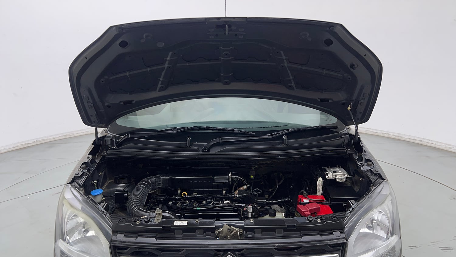 Used 2019 Maruti Suzuki Wagon R VXi (O) 1.2 AMT Petrol Automatic engine ENGINE & BONNET OPEN FRONT VIEW
