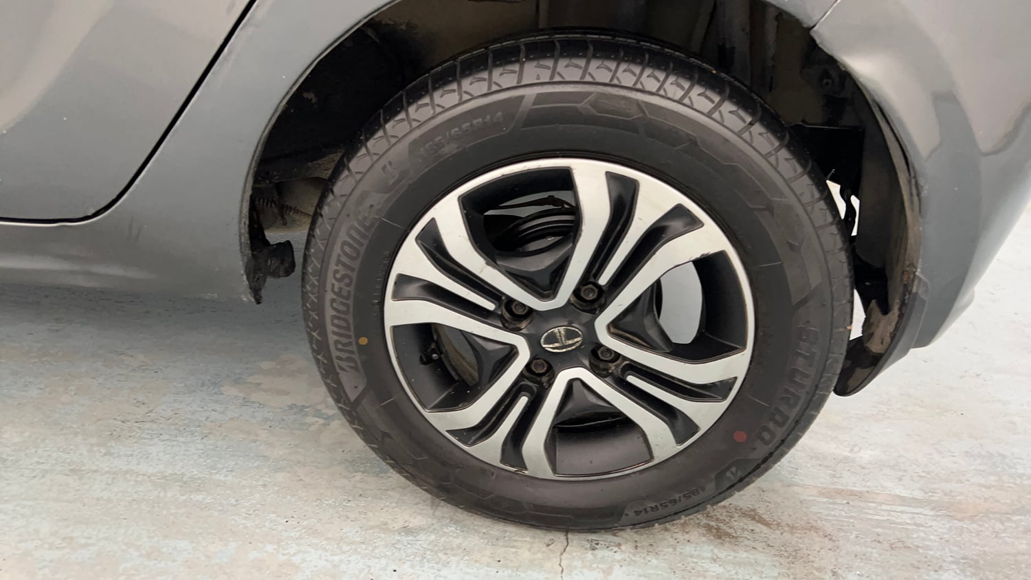 Used 2021 Tata Tiago XZ Petrol Manual tyres LEFT REAR TYRE RIM VIEW