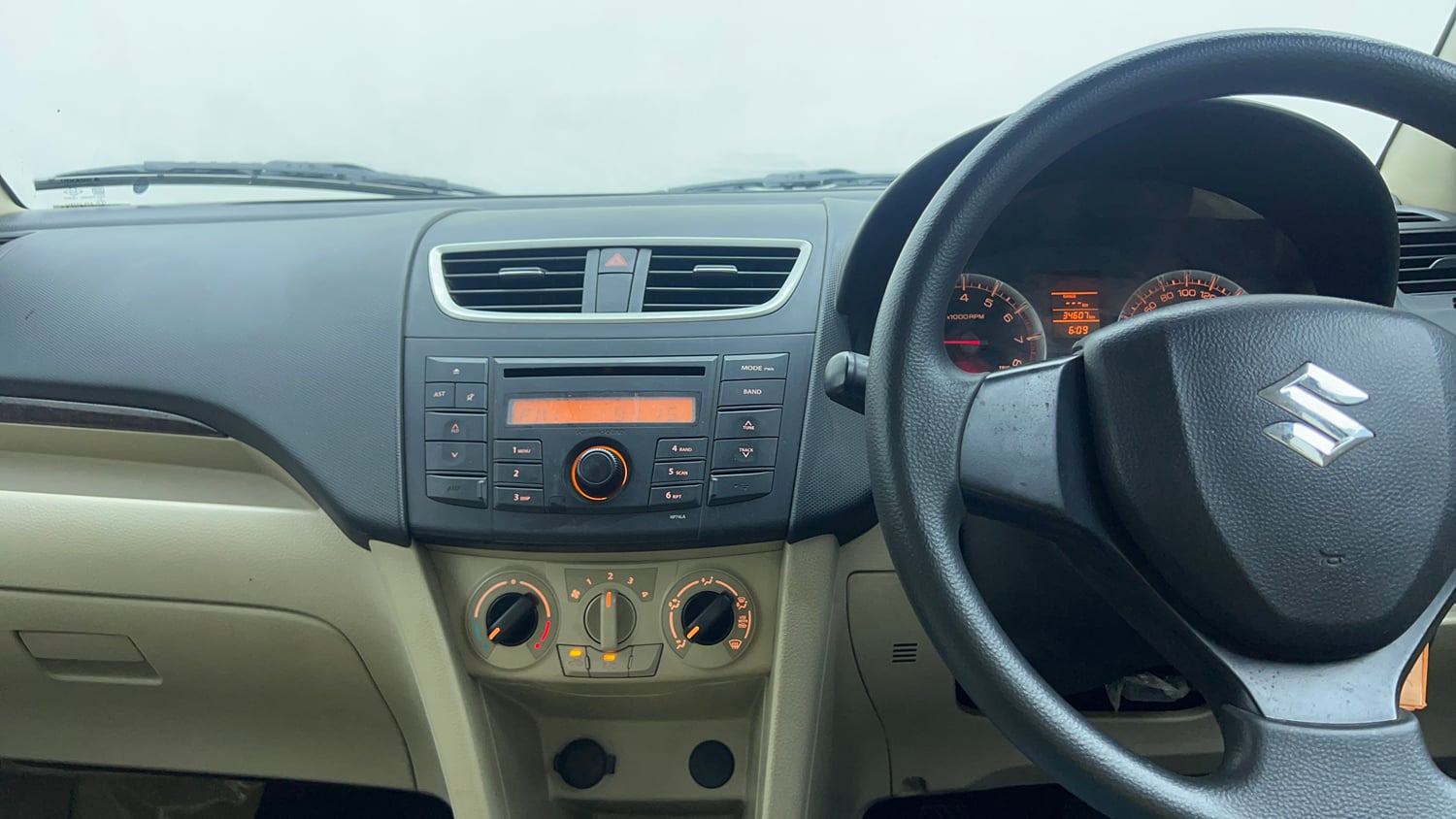 Used 2012 Maruti Suzuki Swift Dzire VXI Petrol Manual top_features Integrated (in-dash) music system