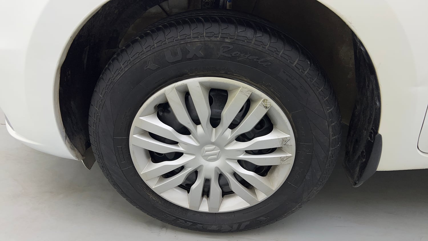 Used 2021 Maruti Suzuki Dzire VXi Petrol Manual tyres LEFT FRONT TYRE RIM VIEW