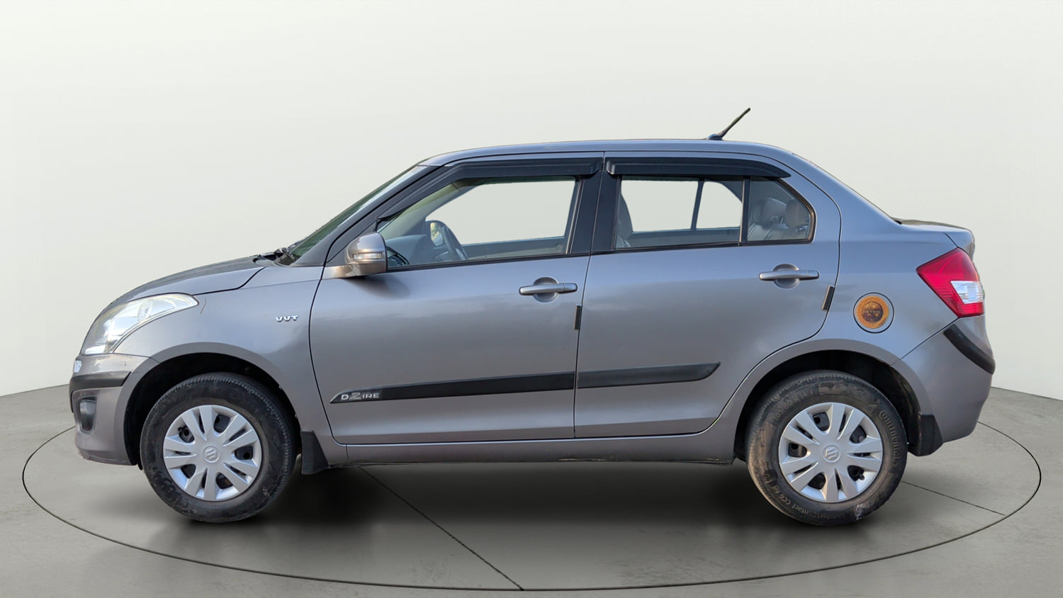 Used 2014 Maruti Suzuki Swift Dzire VXI Petrol Manual exterior LEFT SIDE VIEW