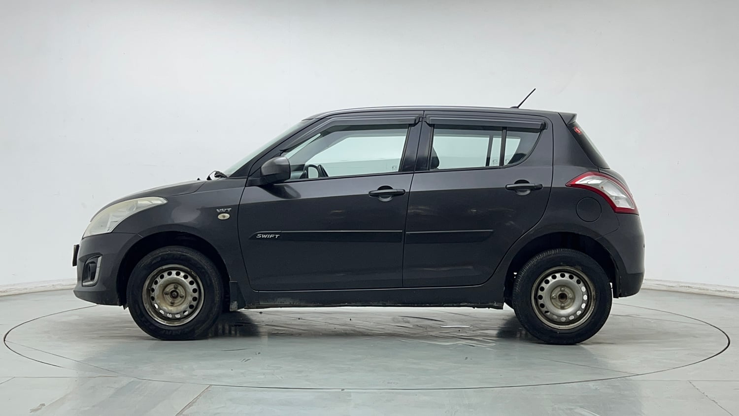Used 2017 Maruti Suzuki Swift Lxi (O) Petrol Manual exterior LEFT SIDE VIEW