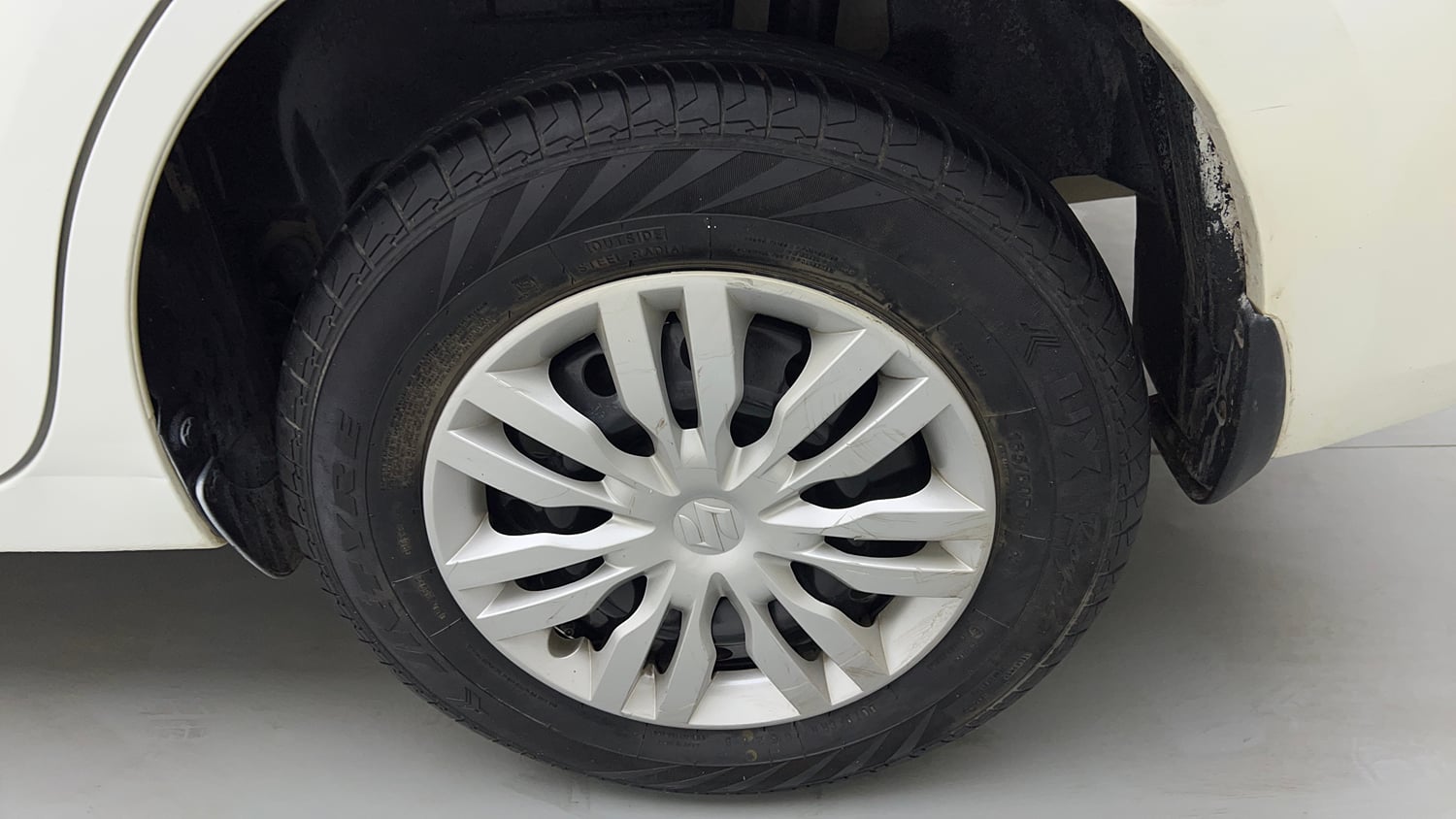 Used 2021 Maruti Suzuki Dzire VXi Petrol Manual tyres LEFT REAR TYRE RIM VIEW