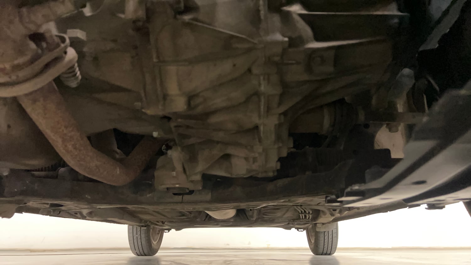Used 2017 Maruti Suzuki Dzire ZXi AMT Petrol Automatic extra FRONT LEFT UNDERBODY VIEW