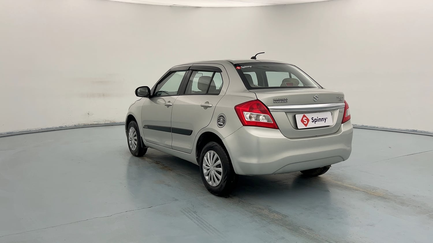 Used 2015 Maruti Suzuki Swift Dzire VXI Petrol Manual exterior LEFT REAR CORNER VIEW