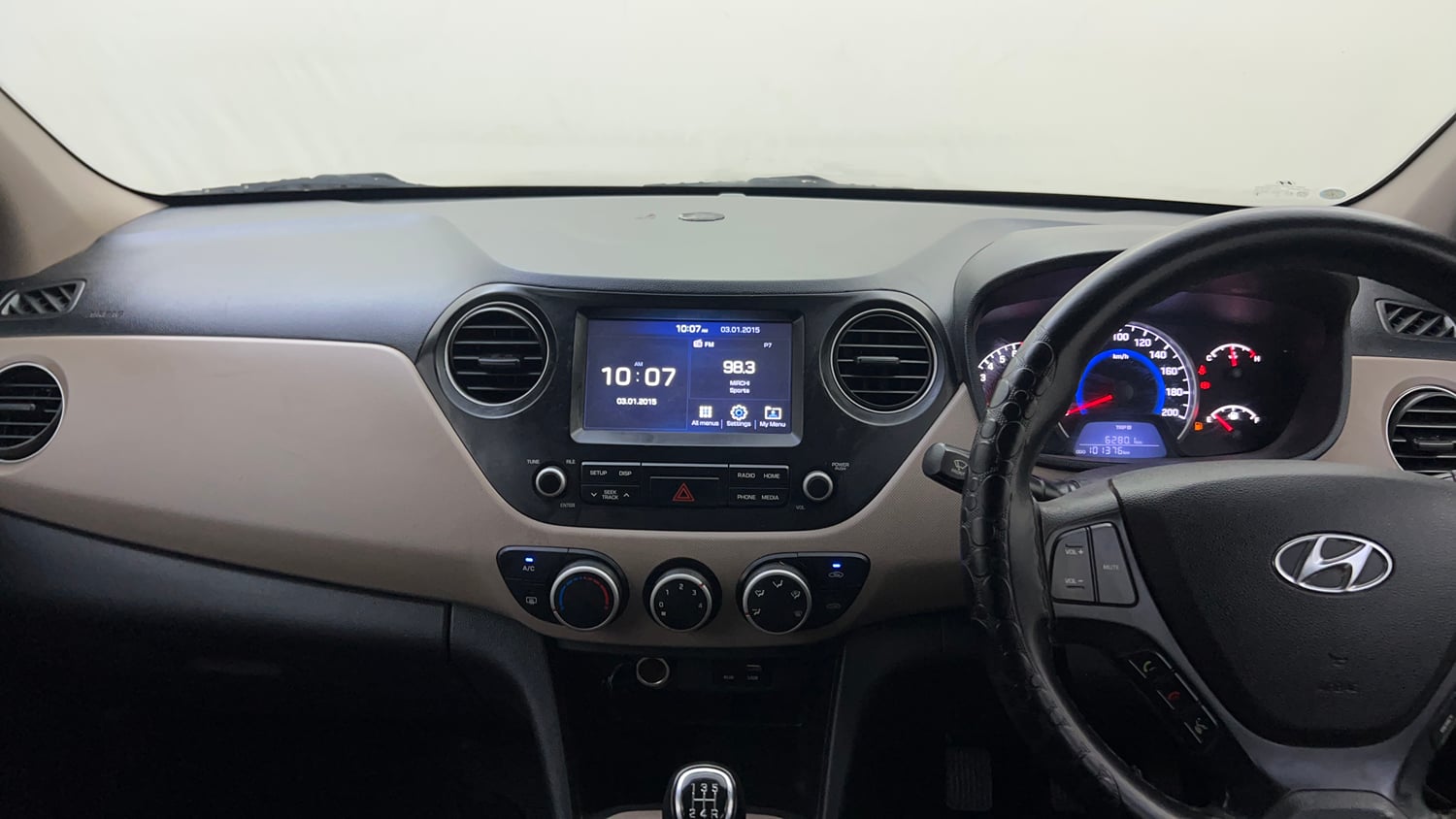 Used 2019 Hyundai Grand i10 Sportz 1.2 Kappa VTVT Petrol Manual interior MUSIC SYSTEM & AC CONTROL VIEW