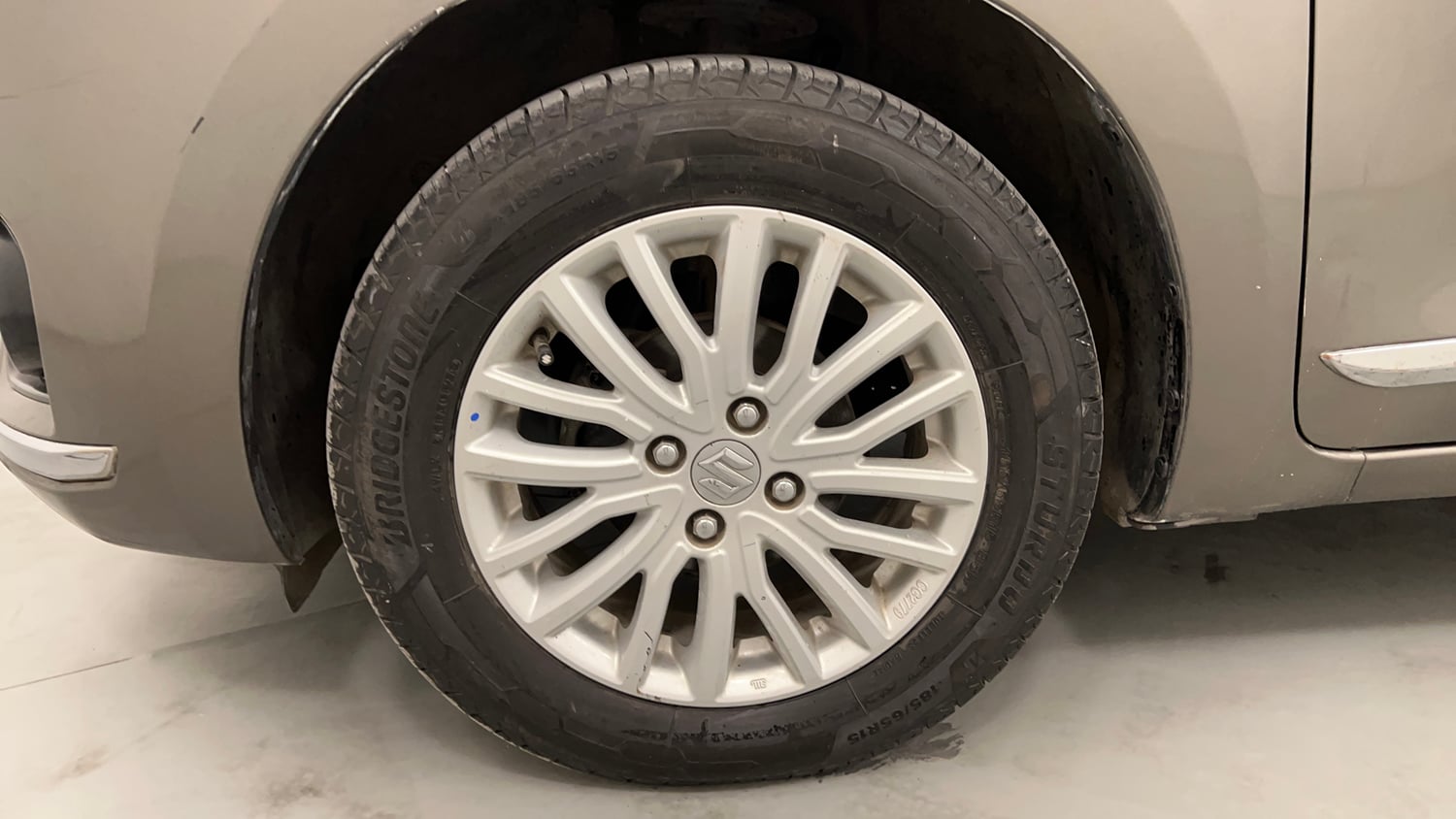 Used 2017 Maruti Suzuki Dzire ZXi AMT Petrol Automatic tyres LEFT FRONT TYRE RIM VIEW