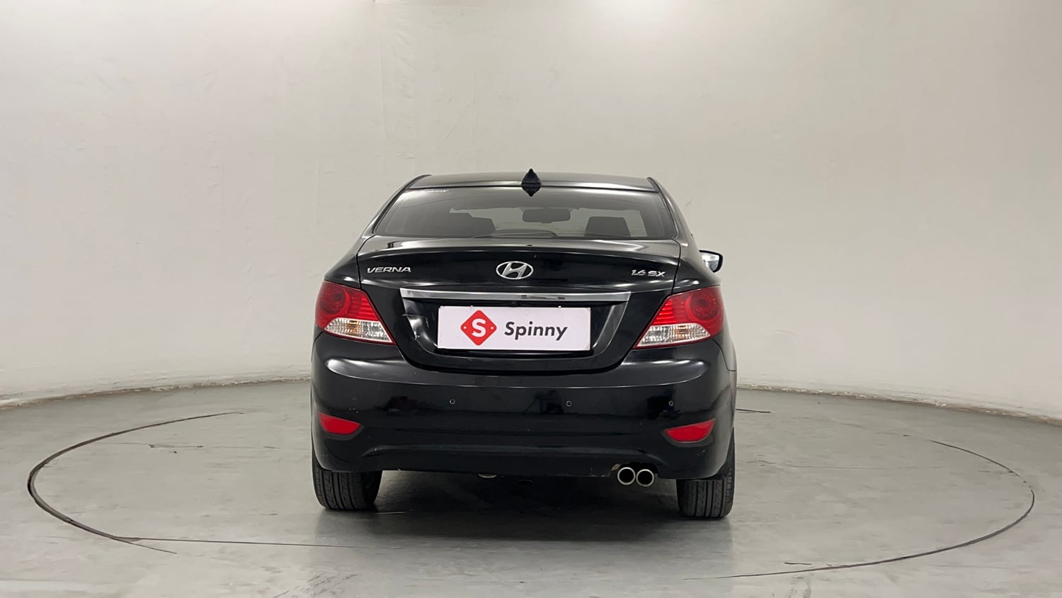 Used 2013 Hyundai Verna Fluidic 1.6 VTVT SX Petrol Manual exterior BACK VIEW