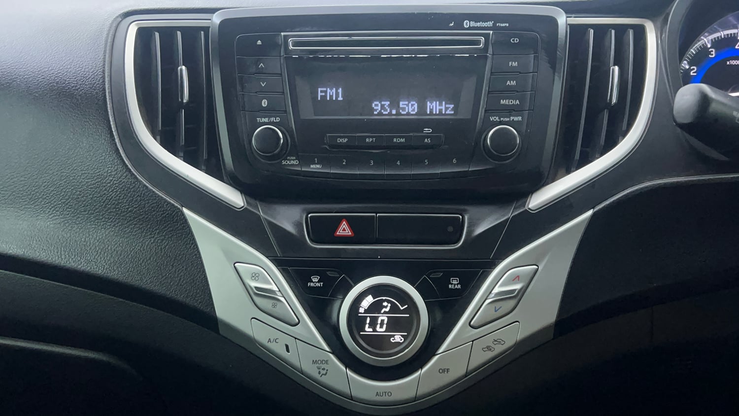 Used 2018 Maruti Suzuki Baleno Zeta 1.2 Petrol Manual interior MUSIC SYSTEM & AC CONTROL VIEW