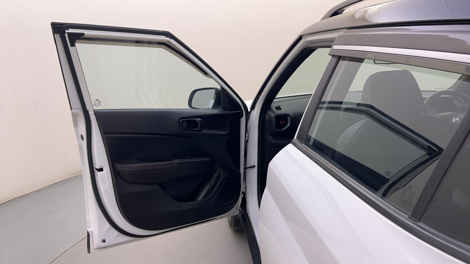 Used 2023 Hyundai Venue N-Line N6 DCT Dual Tone Petrol Automatic interior LEFT FRONT DOOR OPEN VIEW