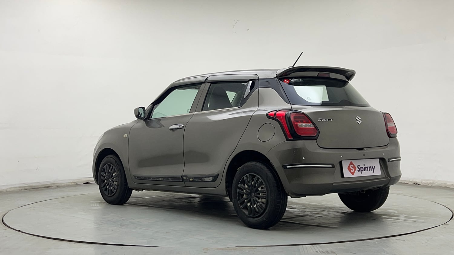 Used 2021 Maruti Suzuki Swift LXi Petrol Manual exterior LEFT REAR CORNER VIEW