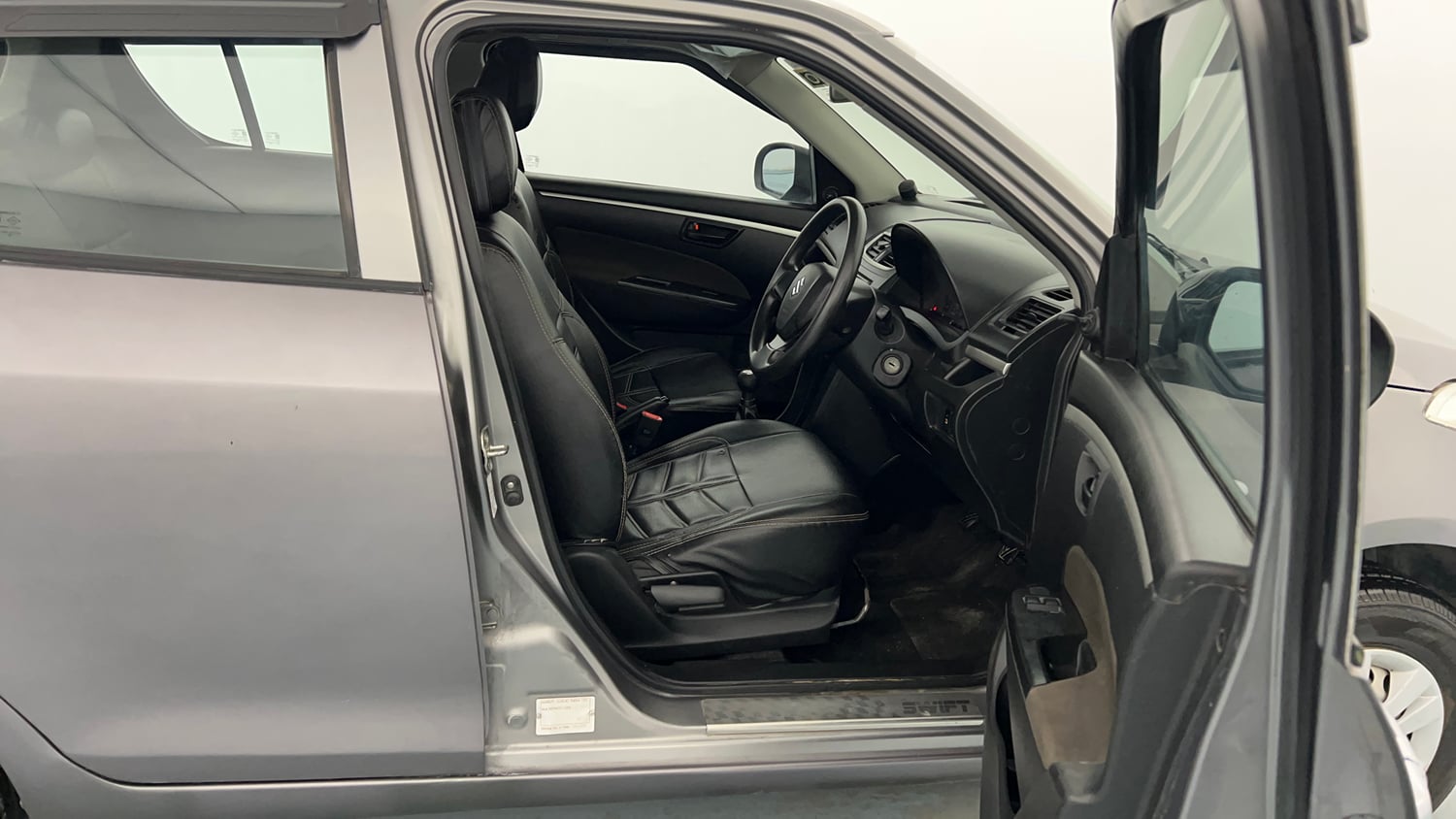 Used 2017 Maruti Suzuki Swift LXi Petrol Manual interior RIGHT SIDE FRONT DOOR CABIN VIEW