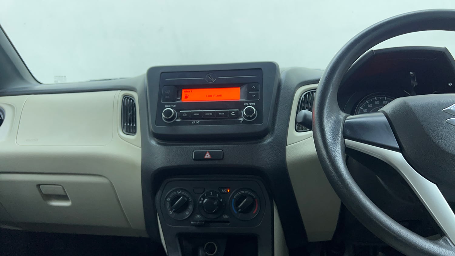 Used 2021 Maruti Suzuki Wagon R 1.0 VXi (O) 1.0 Petrol Manual top_features Integrated (in-dash) music system