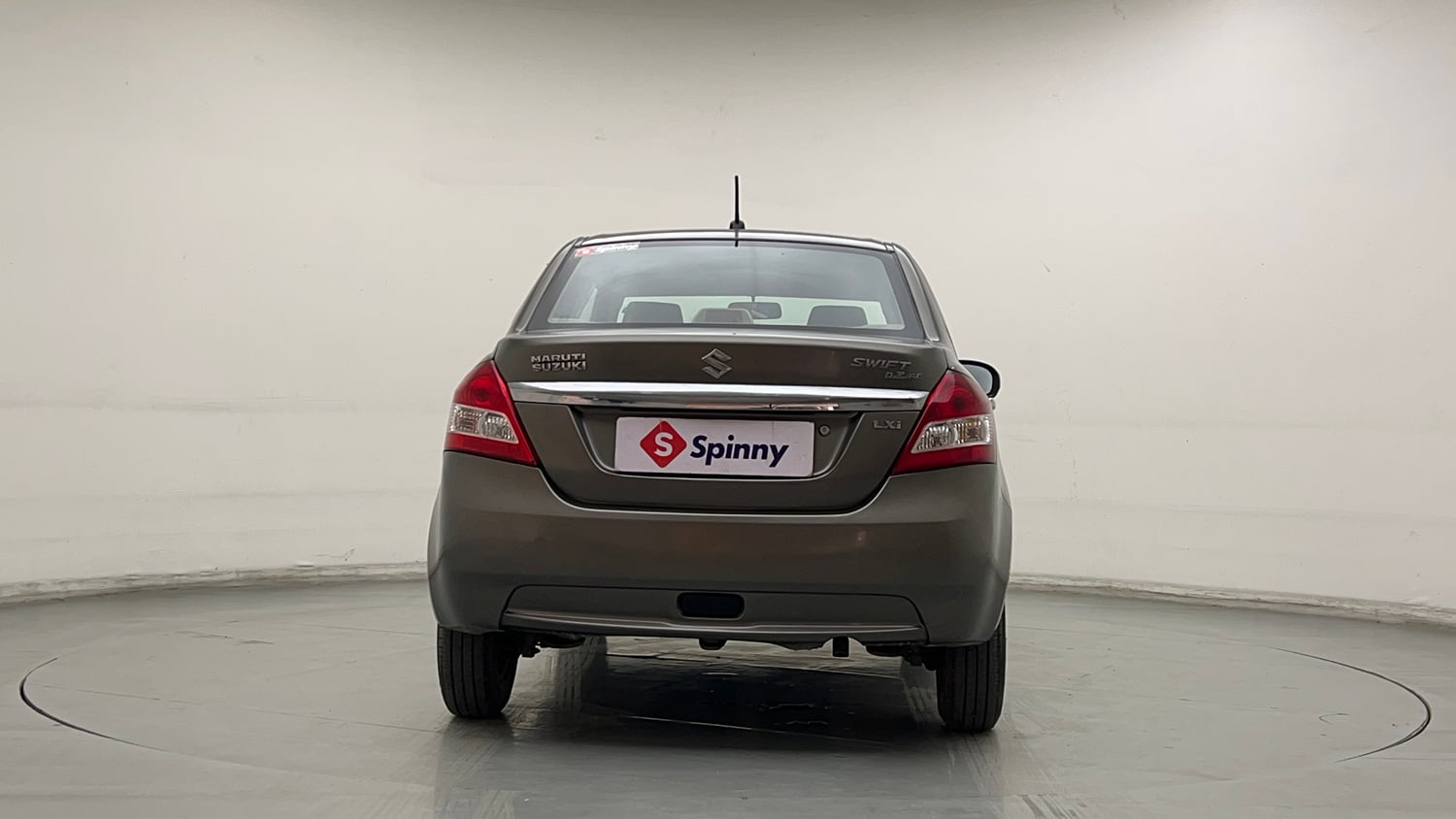 Used 2015 Maruti Suzuki Swift Dzire LXI (O) Petrol Manual exterior BACK VIEW